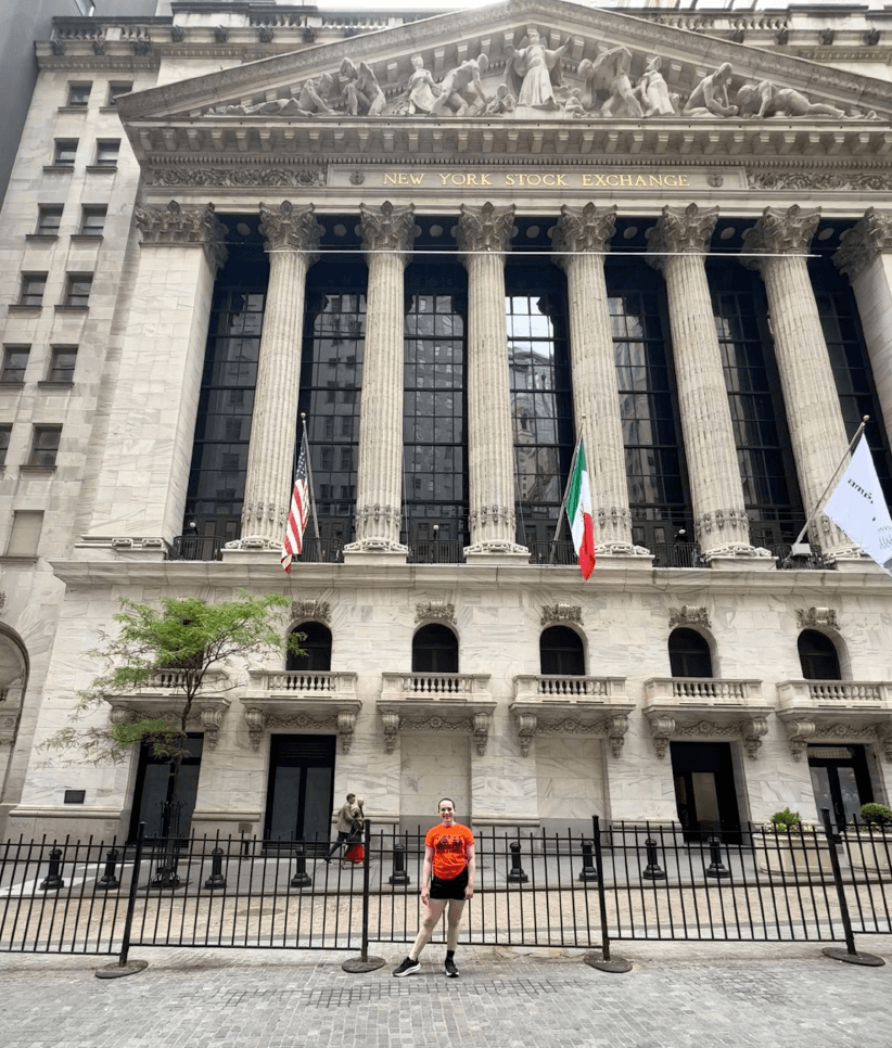 Sophia DeGregorio standing in front of the New York Stock Exchange